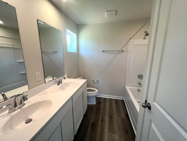 Building Photo - New Three-Bedroom, Two and one-half Bath T...