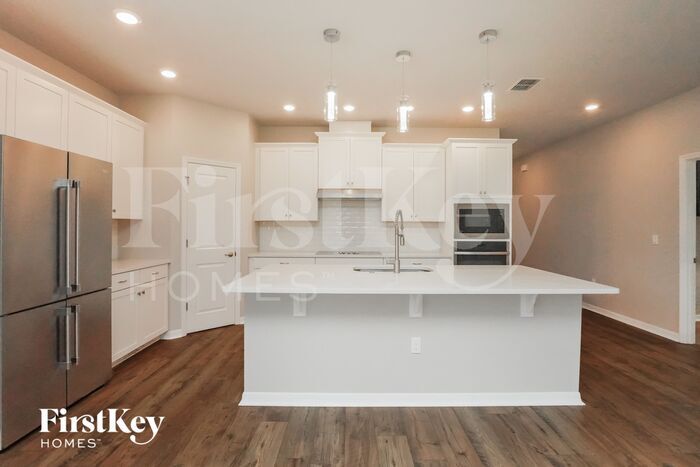 Building Photo - 17827 Passionflower Cir