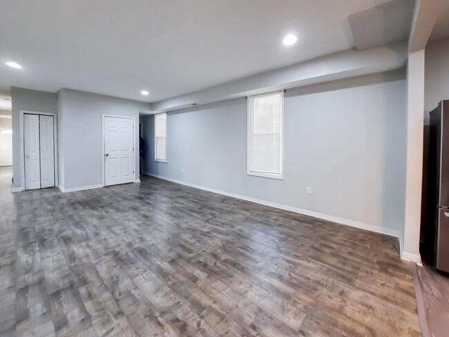 Building Photo - Upgraded 4BR/2.5BA SFH with 1st fl BR. Nea...