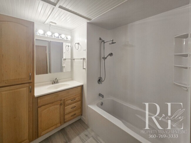 Building Photo - Private Beach Access – Bright, Breezy Livi...