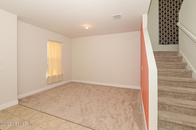 Building Photo - 10976 SW Tessili Wy