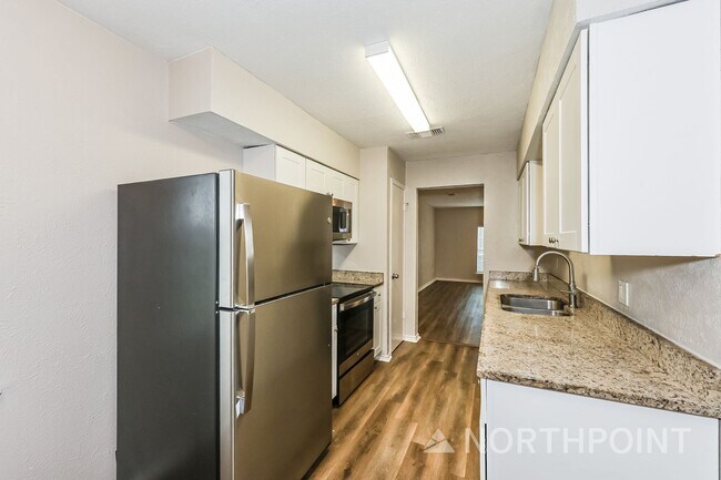 Building Photo - 4 BR/2BA | Newly Renovated Single Family Home | Covered Patio  | Fenced backyard!