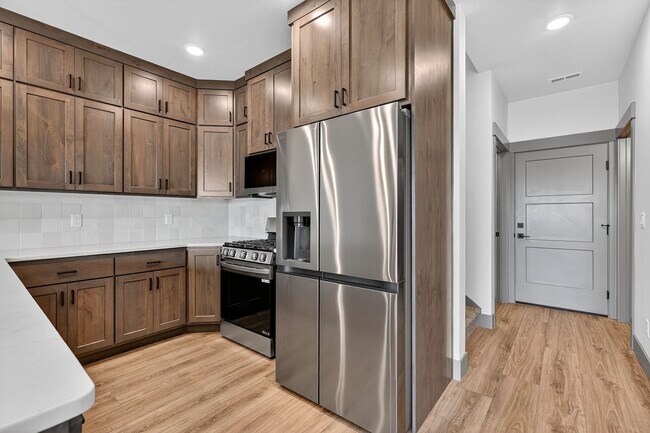 Building Photo - MUST SEE TOWNHOMES IN AMMON RIGHT OFF BEAC...