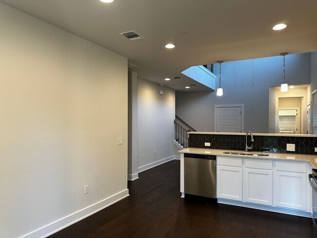 Building Photo - For Lease – Modern 2023 Condo Backing to Greenbelt | Creekside at Pioneer Crossing West