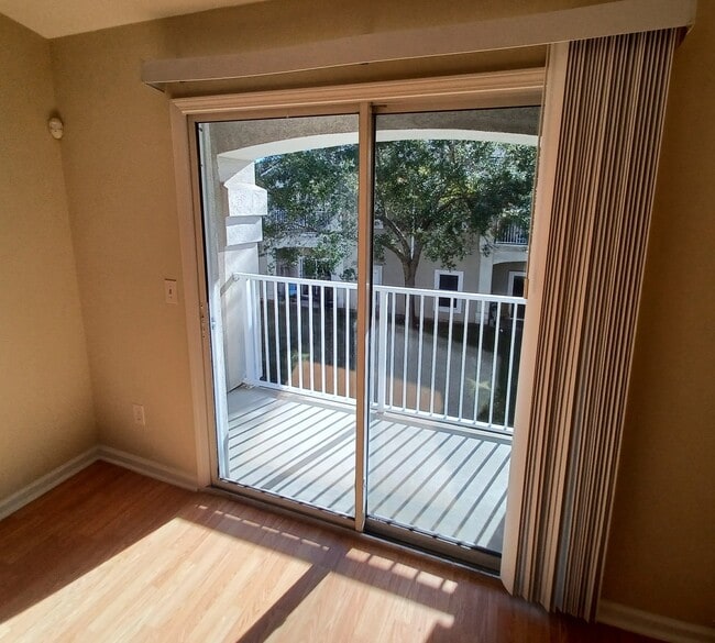 Building Photo - "$500 MOVE-IN SPECIAL! - Beautifully Updated 2/2 Condo in Gated Southside Neighborhood!"