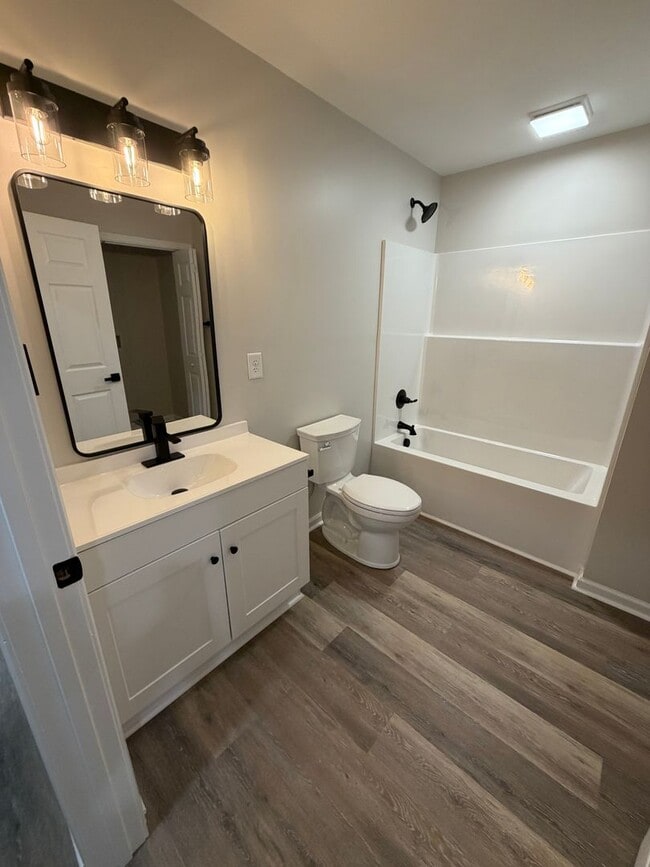 Building Photo - Open concept, location and easy living!