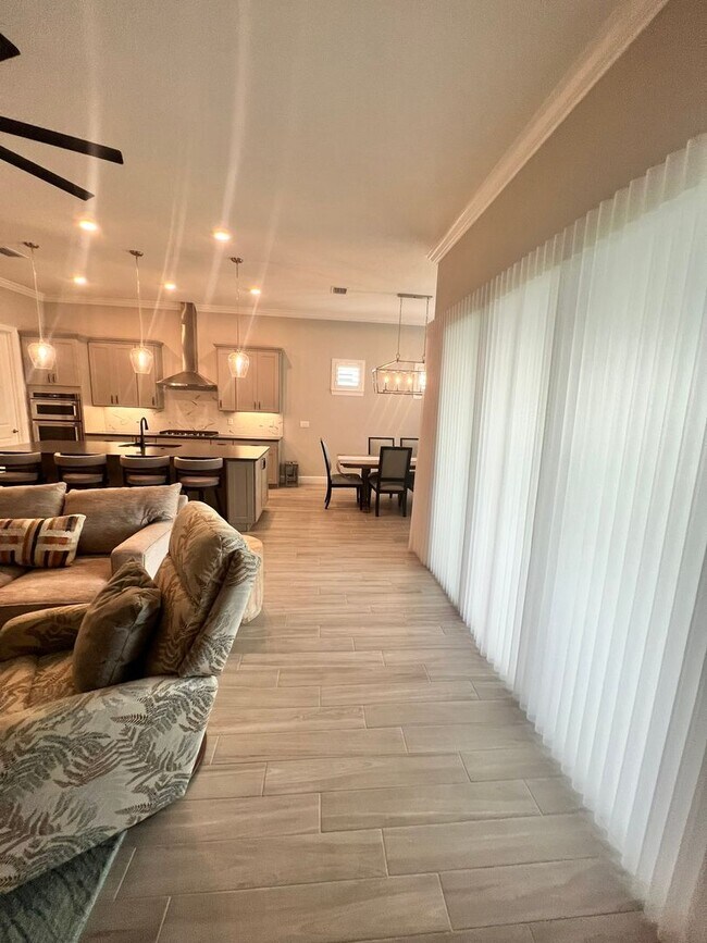 Building Photo - STUNNING LAKEFRONT 3 BEDROOM, 2.5 BATH HOM...
