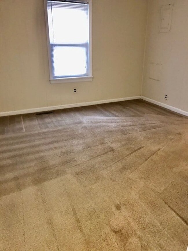 Building Photo - Great Experiences Are Just Around The Corner. Charming 2 bedroom Ranch Style Bungalow.