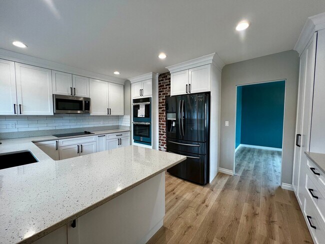 Building Photo - Non-Refundable & Security Deposit Total: $3000.00