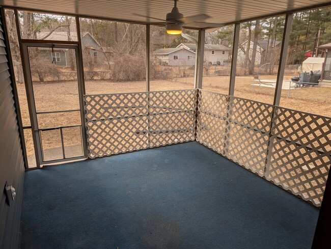 Screened in porch off of master bedroom - 5517 Fieldstone Ln