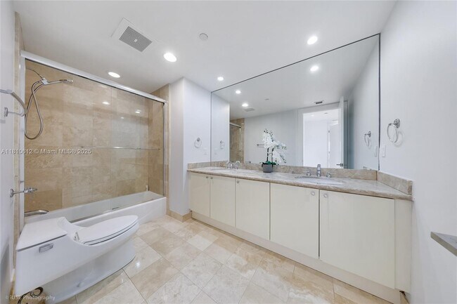 Building Photo - 10225 Collins Ave