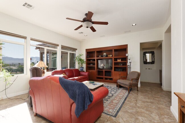 Building Photo - Beautiful home located in the gated commun...