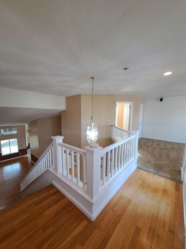 Building Photo - Move in Special: Half OFF your 1st Month's Rent! Elegant 4 Bedroom Home w/ Upstairs Loft Move in ...