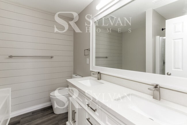 Building Photo - Enjoy living the good life in this 4 bedro...