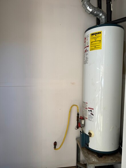 Water Heater and Outside Dryer - 612 Graythorn Ln
