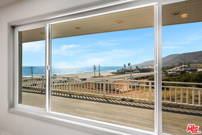 Building Photo - 6457 Surfside Way