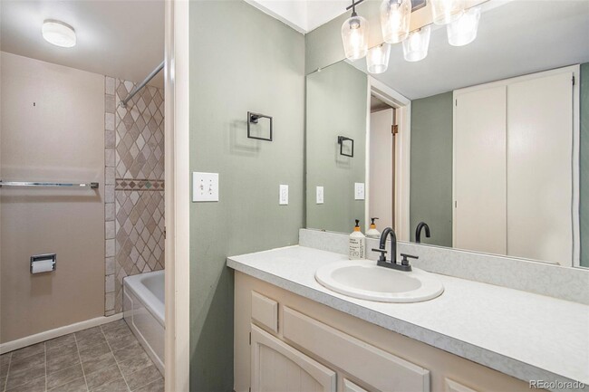 Master bathroom connected to master bedroom. - 701 Harlan St