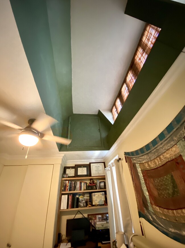 Primary bedroom vaulted ceiling and built in desk - 778 Hobart Pl NW