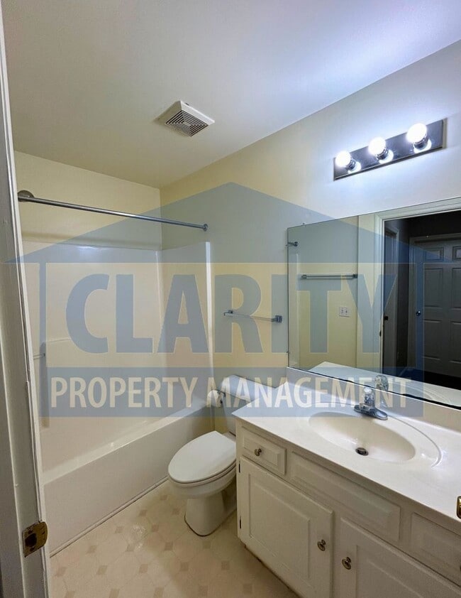 Building Photo - 3-bedroom condo w/ attached garage!