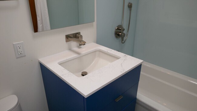 Building Photo - BEAUTIFUL UPDATED FOUR BED / TWO BATH PLUS OFFICE EICHLER HOME WITH GREAT OUTDOOR SPACE