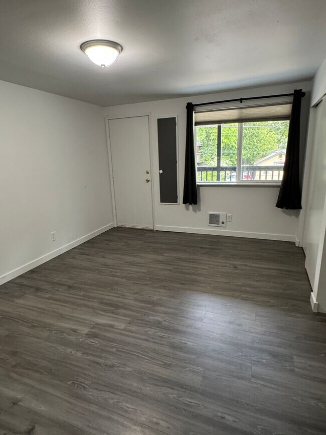 Building Photo - Spacious Two Story (2BR/1BA) Home with Large Fenced-In Yard