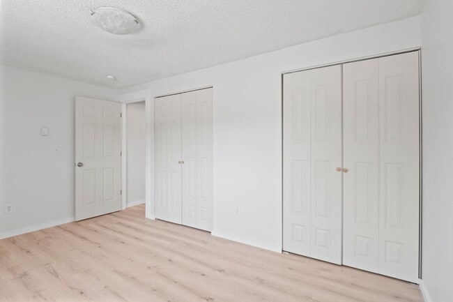 Building Photo - Spacious And Nicely Updated 2 bed 1 Bath Condo unit w/ full size laundry