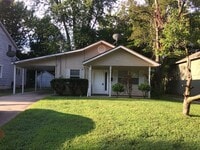 Building Photo - Charming home with a carport