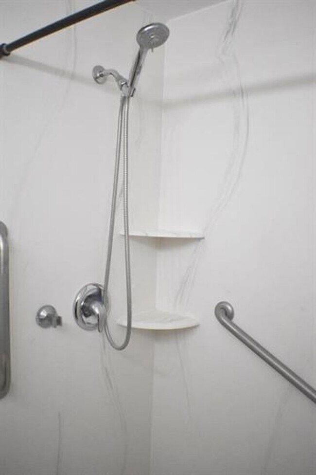 Building Photo - Updated house with original hardwoods and 2-car garage!