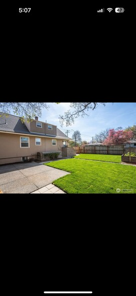 Backyard patio with new sod. - 520 S Wilbur Ave