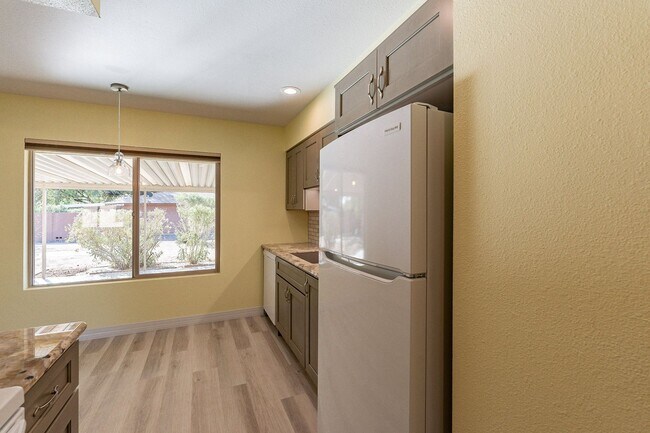 Building Photo - Modern Updated Home in Gated Community of ...