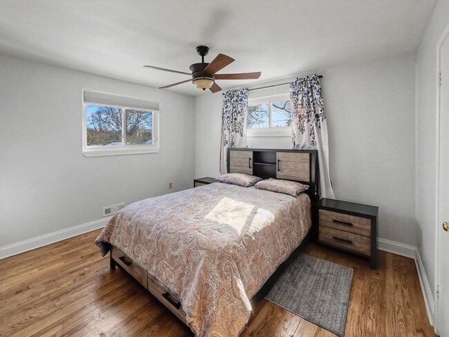 Building Photo - Furnished 4BD 2BA Home with Two kitchens, Basement, and Garage!