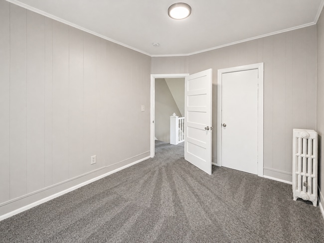 Building Photo - Home with Modern Kitchen, Finished Basement & Backyard Deck