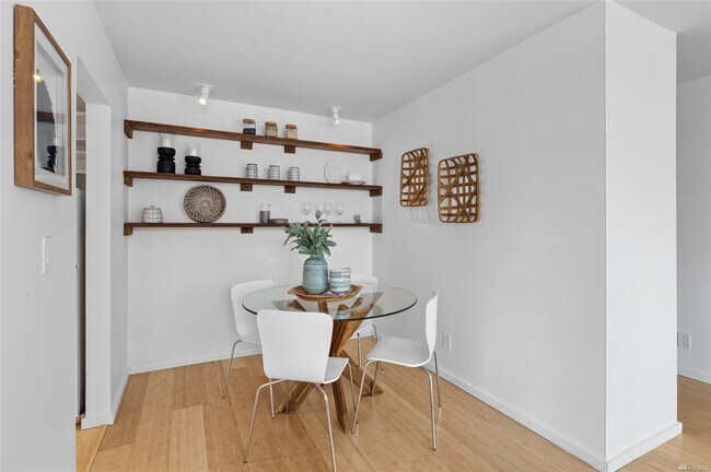 Dining or office nook with ample shelving, also a perfect mount for a projection screen - 730 Bellevue Ave E