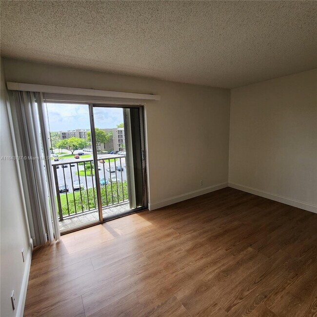 Building Photo - 8550 N Sherman Cir