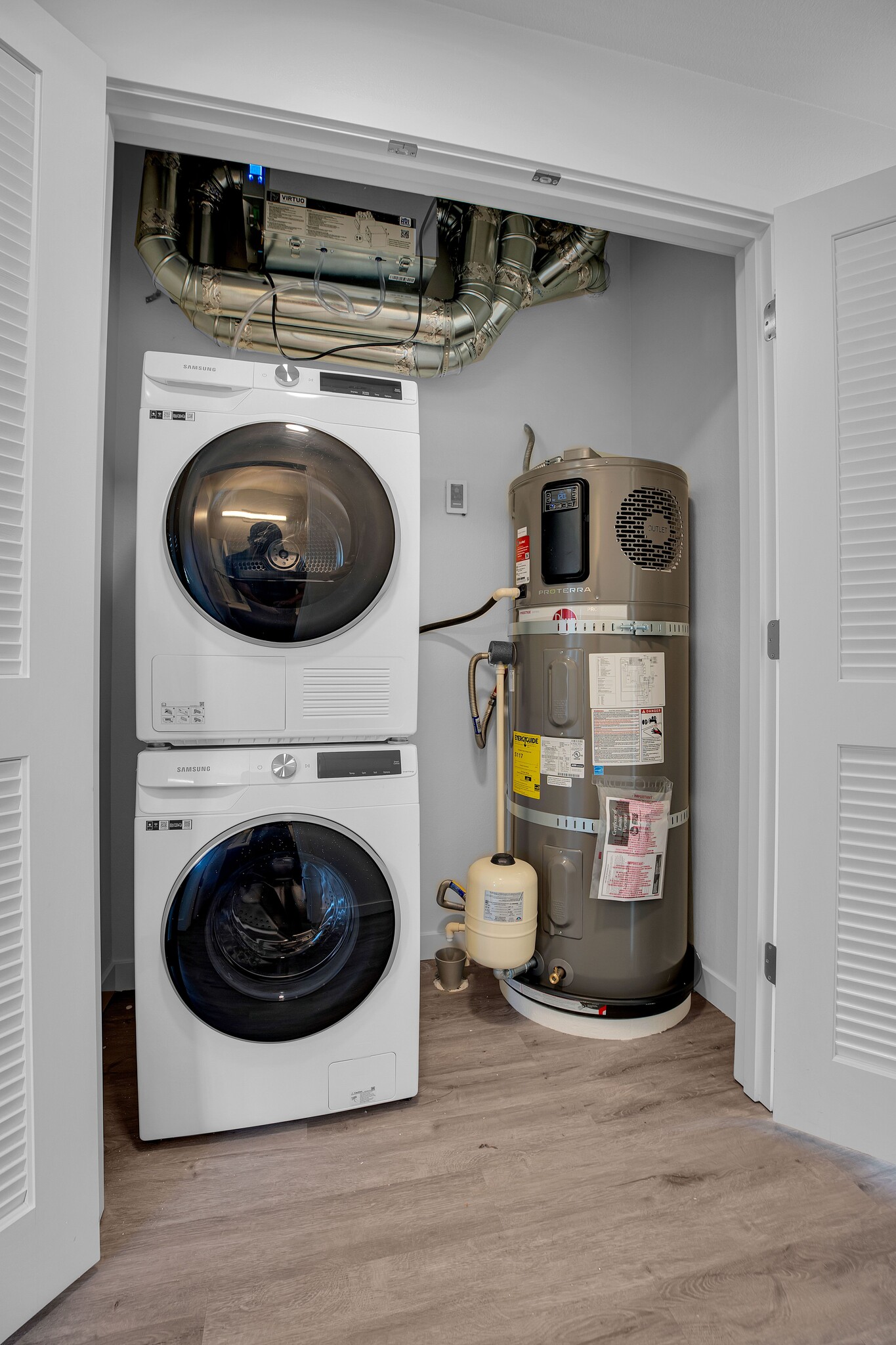 Full size stackable front loading W/D - Terra Lofts Apartments & Townhomes