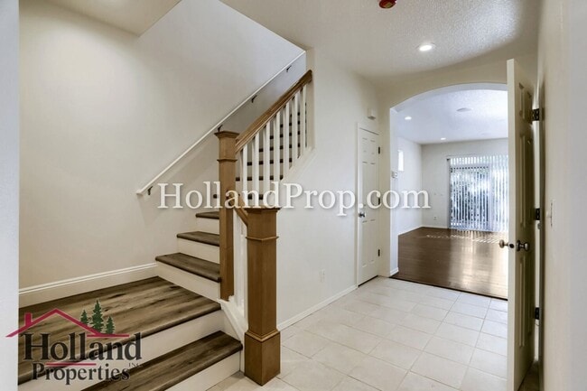 Building Photo - Charming 3-Bedroom Home with Wood Floors, Gas Fireplace & Private Patio