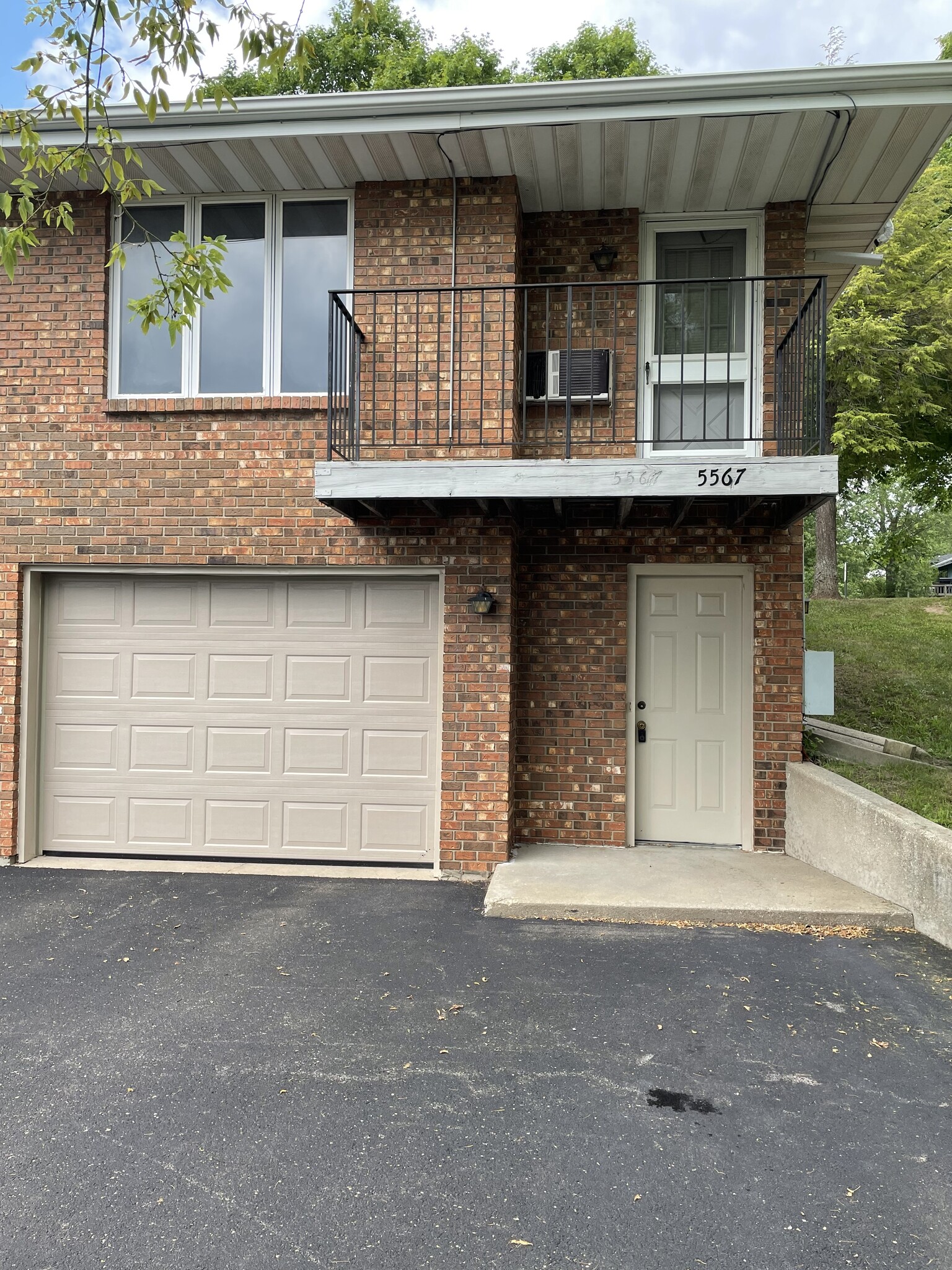 Garage/lower entrance - 5567 Whispering Way