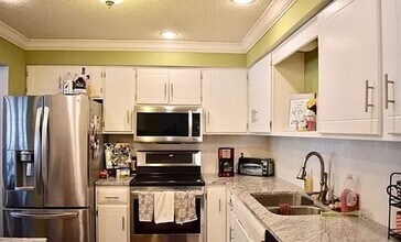 Building Photo - Spacious 3-Bedroom Twin Home in Prime Eden...