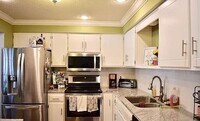Building Photo - Spacious 3-Bedroom Twin Home in Prime Eden...