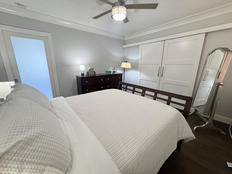 Closet has double sliding doors with wall to wall close storage - 15 S Golfview Rd