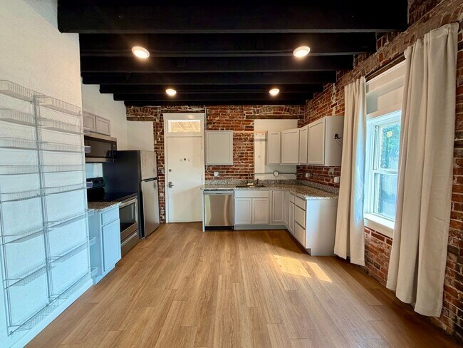 Building Photo - {2202 - A} Spacious Two Bedroom Condo in Historic Pendleton Heights Available Immediately