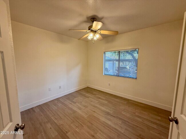 Building Photo - 9555 E Raintree Dr