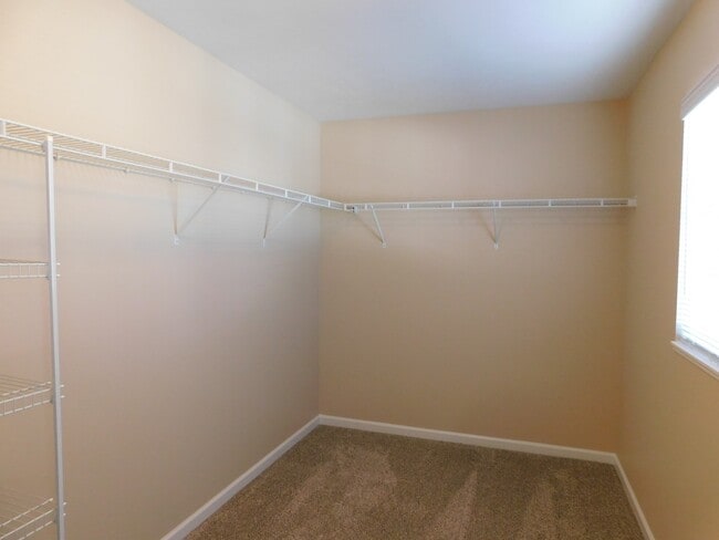 Building Photo - Modern 2-Story Townhome Condo with Resort-...