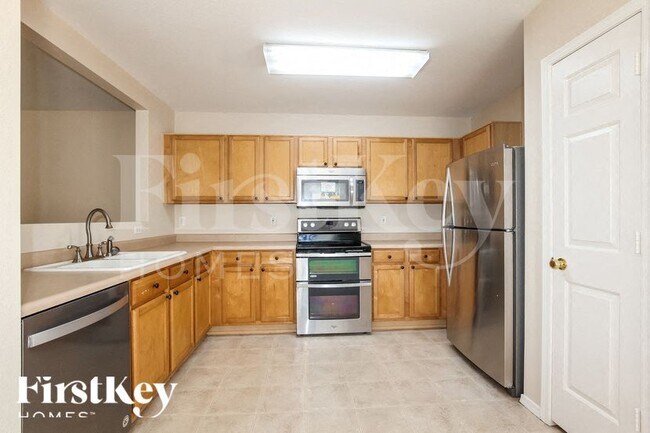 Building Photo - 15552 W Port Au Prince Ln
