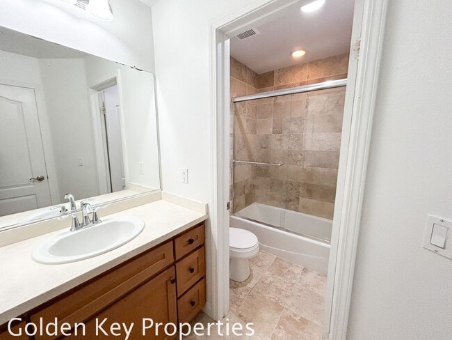 Building Photo - Beautiful Tri-Level Condo in The Bluffs at Carlsbad with Lagoon Views!!