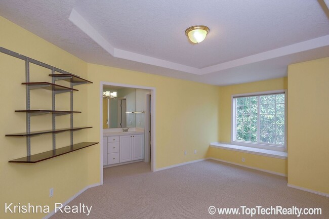 Building Photo - 4 br, 2.5 bath House - 5910 NW Snowlily Dr