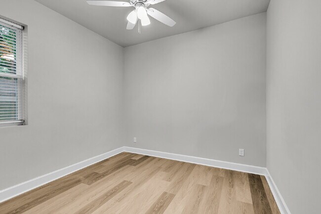 Building Photo - Cute all brick ranch on a large corner lot with fenced in yard and 1 car garage