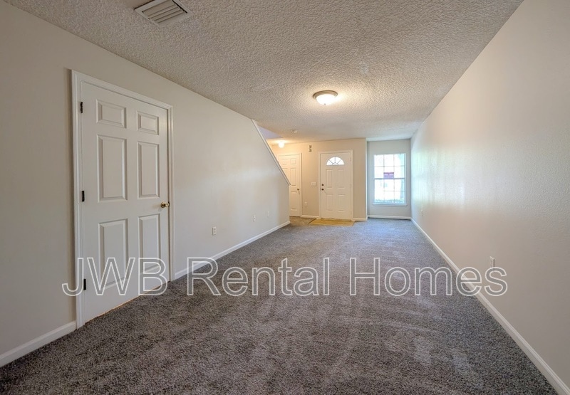 Building Photo - 8473 McGirts Village Ln