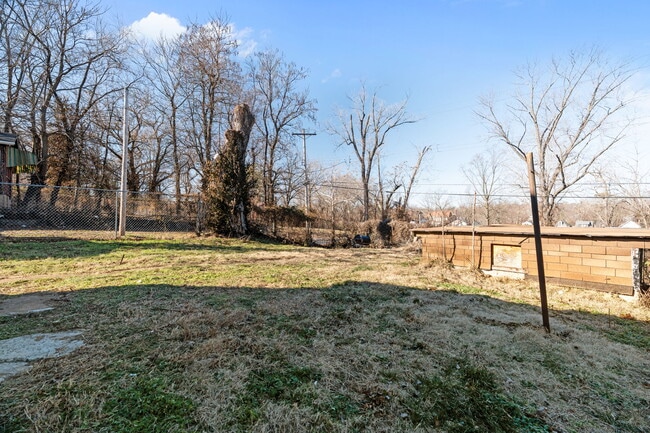 Building Photo - 5451 Genevieve Ave