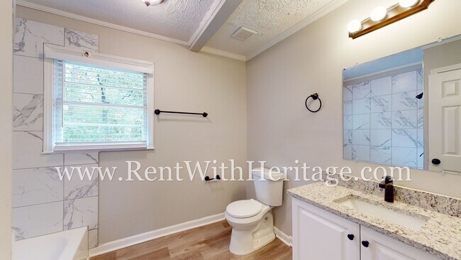 Building Photo - GORGEOUS BRICK RANCH WITH ALL THE UPGRADES...